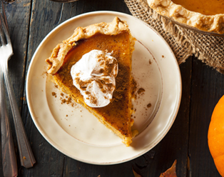 Slice of pumpkin pie on a plate