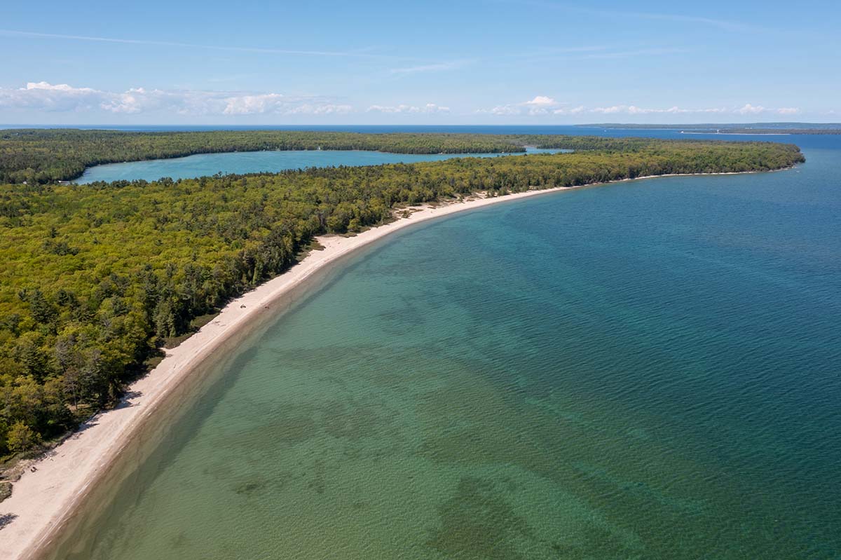 Small, peaceful Europe Lake lays inland at Newport State Park.