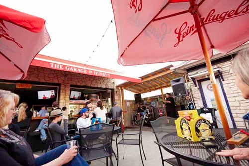 A lively group dines at Husby's during a game.