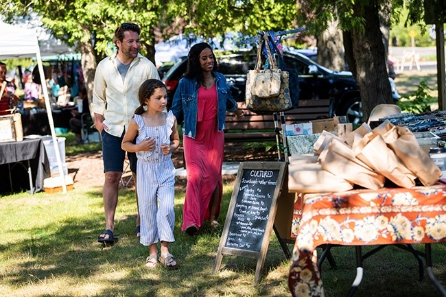 A family at the farmers market.