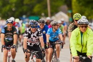 A group of cyclists riding together.