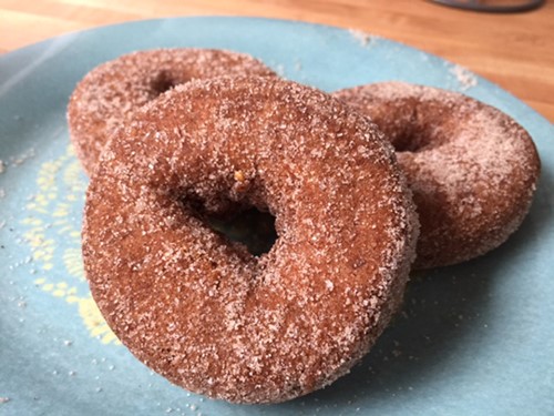 A plate of doughnuts.