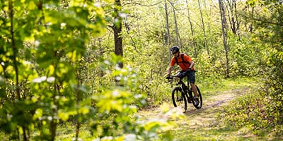 A person trail biking