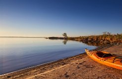A kayak on the beach in Baileys Harbor.